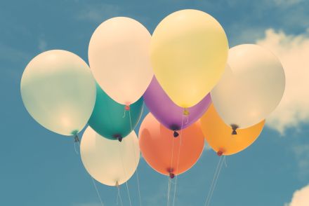 Assorted-color Aired Balloons Under Blue Sky